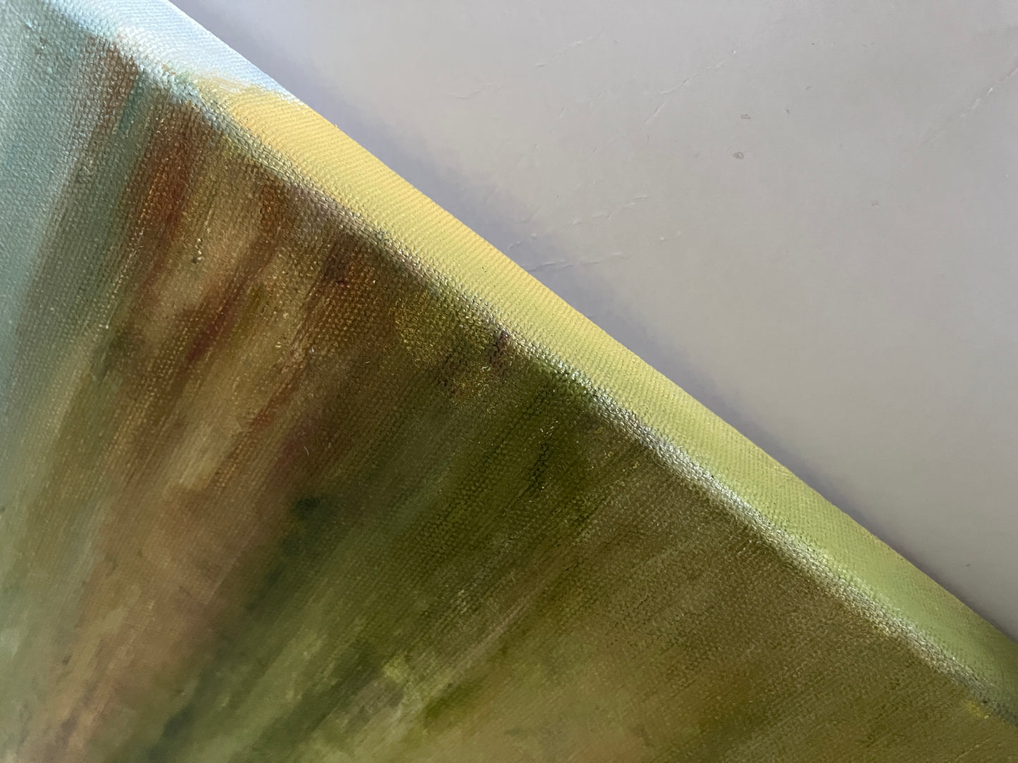 Close-up of a textured surface with a gradient from green to brown.